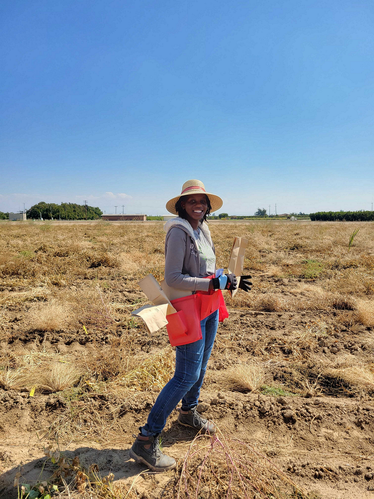 Sassoum Lo standing in an open field